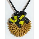 Round Pendant with Rice Grains and Stone Beads