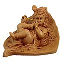 Krishna Resting on Leaf