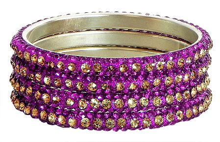Four Magenta with Golden Stone Studded Bangles