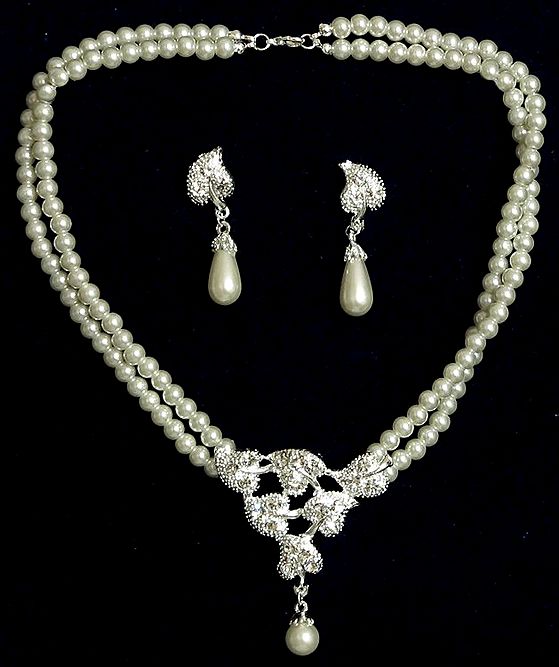 Artificial Pearl Necklace with Stone Studded Pendant and Earrings