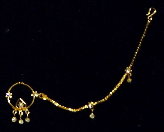 White Stone Studded and Gold Plated Nose Ring with Chain
