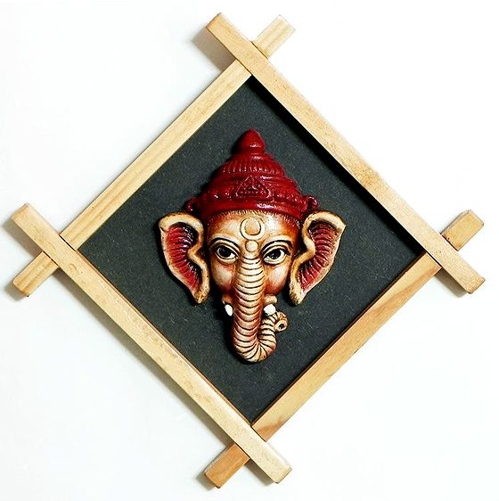 Ganesha Face on a Wooden Frame Wall Hanging