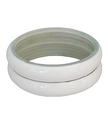Pair of Off-White Acrylic Bangles
