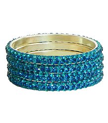 Four Cyan Stone Studded Bangles