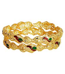 A Pair of Gold Plated Meenakari Bangles