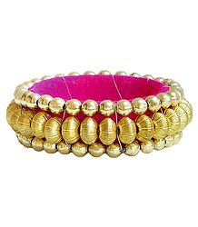 Golden Bead Bracelet with Magenta Cloth Lining