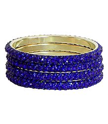 Four Blue Stone Studded Bangles