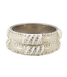 Pair of Off-White Metal Bangles with Stone and Beads