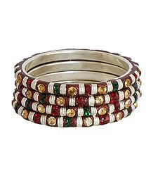 Four Red, Green and Peach Color Stone Studded Bangles