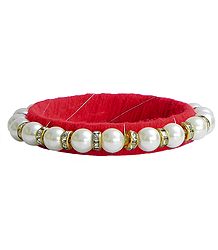 White Stone Studded and Faux Pearl Bead Bracelet with Red Cloth Lining