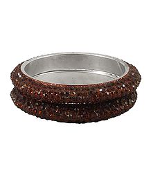 A Pair of Rust Color Stone Studded Bangles