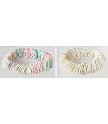 A Pair of White and Multicolor Shell Stretch Bracelet