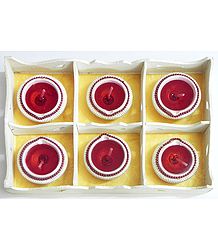Set of Six Red Wax Candles in Terracotta Containers with a Plywood Tray