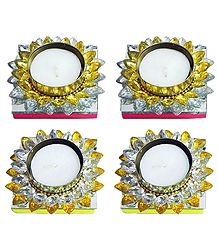 Set of Four Floating Wax Candles in Metal Container Decorated with White and Yellow Glass Stones