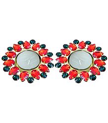 Set of Two Floating Wax Candles in Metal Container Decorated with Red and Green Cut Glass Stones