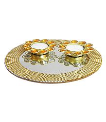 Set of Two Wax Candles in Metal Containers Decorated with Yellow Stones on Mirrored Plate