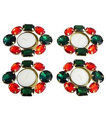 Set of Four Floating Wax Candles in Metal Container Decorated with Red and Green Glass Stones
