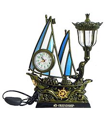 Battery Operated Table Clock in a Acrylic Sailing Ship with Lamp