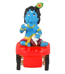 Krishna Sitting on Car