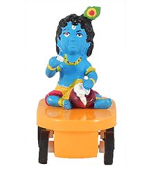 Krishna Sitting on Car