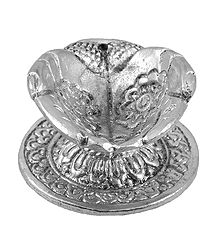 Oil Lamp on Metal Hand