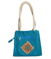 Blue Appliqued Bag with Two Open Pockets and Two Zipped Pockets