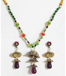 Black and Green Beaded Necklace with Stone Studded Pendant and Earrings