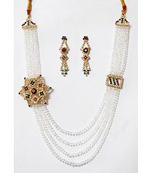 Four Layer White Crystal Necklace with Stone Studded Side Pendant and Earrings