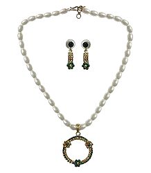 Synthetic White Bead Necklace with Green Stone Studded Pendant and Earrings