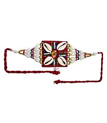 Multicolor Beaded Armlet with Cowrie on Maroon Cloth