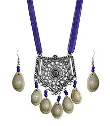 Metal Pendant and Cowrie Earrings with Adjustable Purple Ribbon