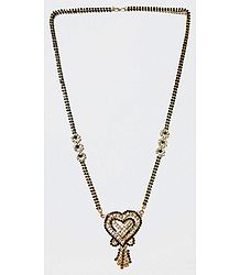 Gold Plated and Faux Zirconia and Black Onyx Studded Mangalsutra with Heart Shaped Pendant