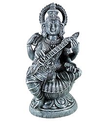 Devi Saraswati Sitting on Lotus