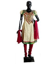 Beige Cotton Kurta with Mirrorwork and Embroidered Neckline with Red Churidar and Chunni
