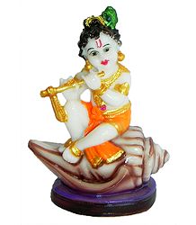 Makhan Chor Krishna Sitting on Conch