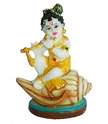 Makhan Chor Krishna Sitting on Conch