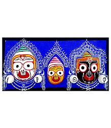Wooden Faces of Jagannath, Balaram and Subhadra on Hardboard - Wall Hanging